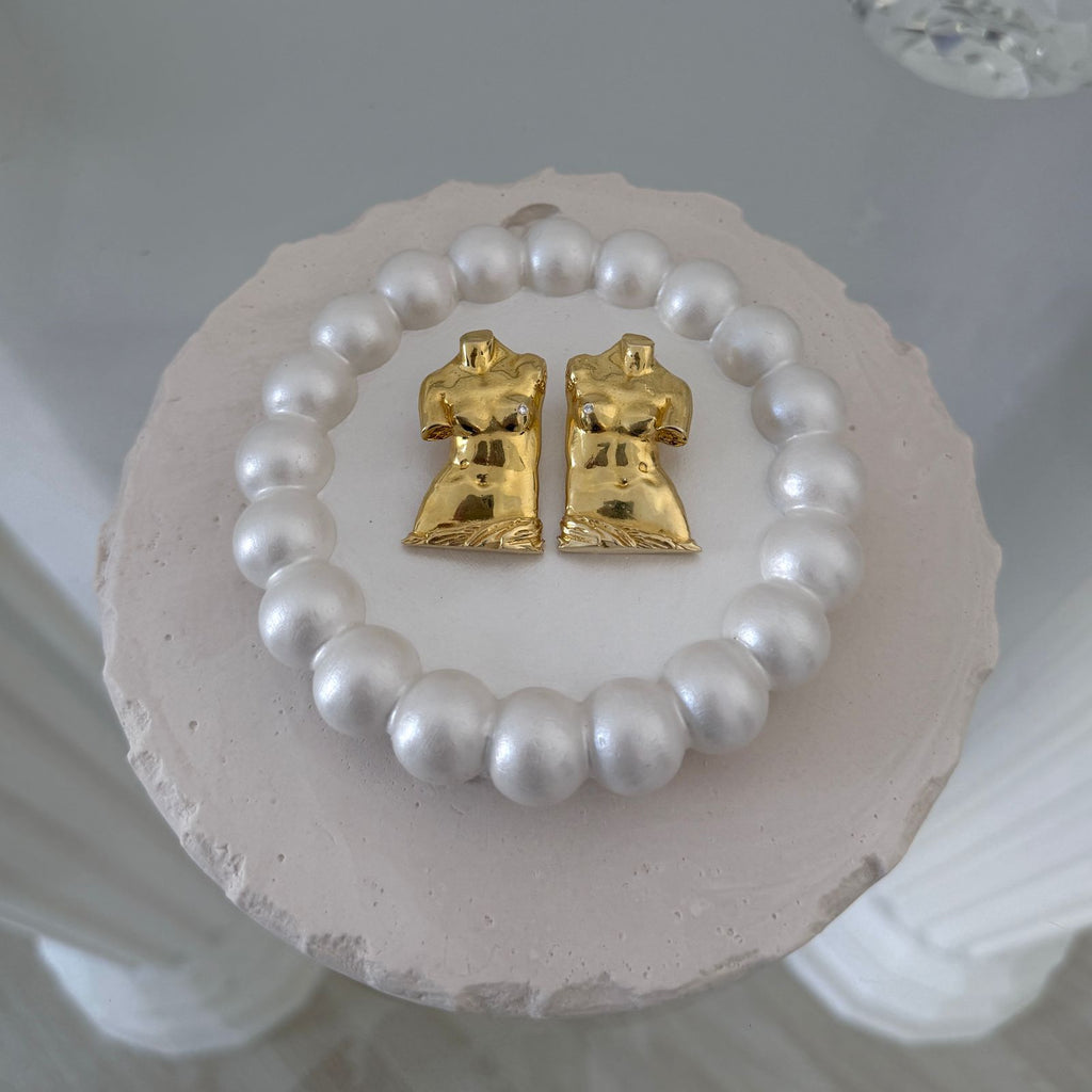 "Power of Detachment" - ვერცხლის სკულფტურული საყურე