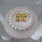 "Power of Detachment" - ვერცხლის სკულფტურული საყურე